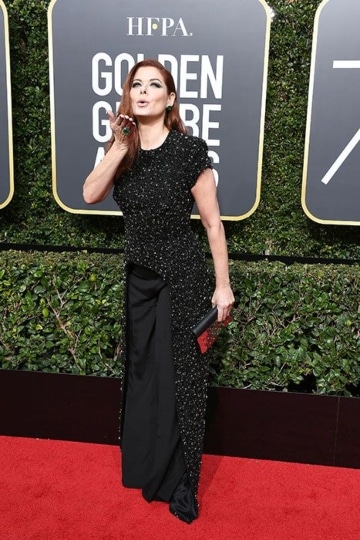 Debra Messing balanced the sequins with formal trousers.(Pinterest)