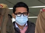 Accused Shankar Mishra leaves IGI Police Station after questioning in connection with the Air India passenger urinating case, in New Delhi on Saturday. 