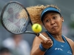 Naomi Osaka, of Japan, returns the ball against Sara Sorribes Tormo, of Spain, during their match at the Mutua Madrid Open tennis tournament Naomi Osaka, of Japan, returns the ball against Sara Sorribes Tormo, of Spain, during their match at the Mutua Madrid Open tennis tournament