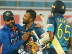 Sri Lanka batsman Dasun Shanaka with Indian captain Rohit Sharma during the 1st ODI match (PTI) Sri Lanka batsman Dasun Shanaka with Indian captain Rohit Sharma during the 1st ODI match (PTI)