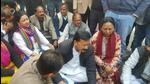 Congress leaders, led by state party president Karan Mahara, stage a sit-in protest in front of the chief minister’s residence in Dehradun on Tuesday. (HT Photo)