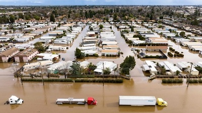 An aerial view of a flooded neighborhood in Merced, California on January 10. President Joe Biden issued an emergency declaration on Monday to support storm response and relief efforts in more than a dozen counties. (Josh Edelson / AFP)