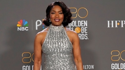 Angela Bassett, winner of the award for best performance by an actress in a supporting role in any motion picture for "Black Panther: Wakanda Forever," poses in the press room at the 80th annual Golden Globe Awards at the Beverly Hilton Hotel. She wore a magnificent silver embellished gown to the awards night. (Invision) Angela Bassett, winner of the award for best performance by an actress in a supporting role in any motion picture for "Black Panther: Wakanda Forever," poses in the press room at the 80th annual Golden Globe Awards at the Beverly Hilton Hotel. She wore a magnificent silver embellished gown to the awards night. (Invision)