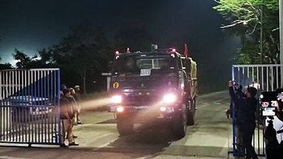 IAF personnel in action at Gujarat's Jamnagar after a Moscow-Goa flight landed under a bomb threat. IAF personnel in action at Gujarat's Jamnagar after a Moscow-Goa flight landed under a bomb threat.