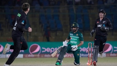 Pakistan's Mohammad Nawaz, center, reacts as he is bowled out by New Zealand's Michael Bracewell (AP)