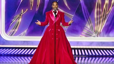 Emmy and Tony winner Billy Porter knows how to work a carpet. He wore a vibrant magenta tuxedo dress from Siriano and sparkly platform shoes.&nbsp; (REUTERS)