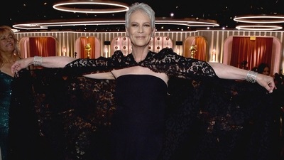 Jamie Lee Curtis, a nominee for Everything Everywhere All at Once, donned a black Valentino pantsuit with a flowing lace cape.&nbsp; (REUTERS)