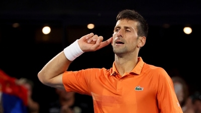 Serbia's Novak Djokovic celebrates winning the final of the Adelaide International tennis tournament against USA's Sebastian Korda in Adelaide, Australia, Sunday, Jan. 8, 2023. (AP Photo/Kelly Barnes) (AP)