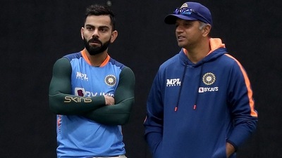 Virat Kohli with Rahul Dravid(right) (AFP) Virat Kohli with Rahul Dravid(right) (AFP)