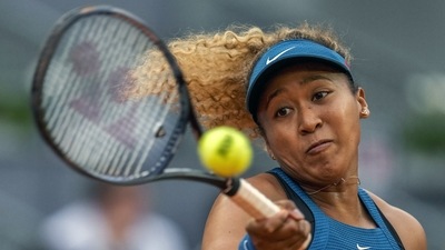Naomi Osaka, of Japan, returns the ball against Sara Sorribes Tormo, of Spain, during their match at the Mutua Madrid Open tennis tournament (AP) Naomi Osaka, of Japan, returns the ball against Sara Sorribes Tormo, of Spain, during their match at the Mutua Madrid Open tennis tournament (AP)