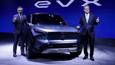 Representative Director and President of Suzuki Motor Corporation Toshihiro Suzuki and Managing Director and CEO of Maruti Suzuki India Limited Hisashi Takeuchi pose with the Maruti Suzuki electric concept SUV as it is unveiled at the Auto Expo 2023 in Greater Noida on Wednesday. (REUTERS)