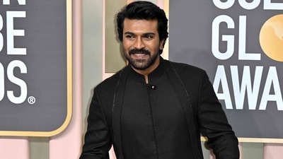 Ram Charan was all smiles as he posed solo on the red carpet at Golden Globes 2023. Ram Charan was all smiles as he posed solo on the red carpet at Golden Globes 2023.