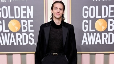 Wednesday actor Percy Hynes White attends the 80th Annual Golden Globe Awards in a see-through black shirt, notch-lapel blazer and baggy pants. (Getty Images via AFP) Wednesday actor Percy Hynes White attends the 80th Annual Golden Globe Awards in a see-through black shirt, notch-lapel blazer and baggy pants. (Getty Images via AFP)