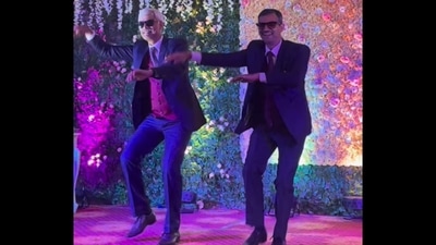 Elderly men, dressed in black suits, dancing to Amitabh Bachchan and Govinda’s song Bade Miyan Chhote Miyan. (Instagram/@sangeet_with_salvi) Elderly men, dressed in black suits, dancing to Amitabh Bachchan and Govinda’s song Bade Miyan Chhote Miyan. (Instagram/@sangeet_with_salvi)