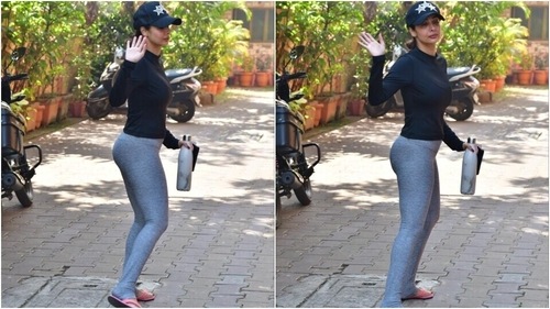 Malaika waved at the cameras. (HT Photos/Varinder Chawla) Malaika waved at the cameras. (HT Photos/Varinder Chawla)