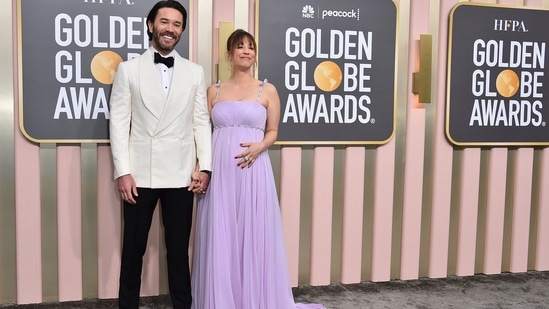 Tom Pelphrey and Kaley Cuoco arrived in style at the 80th annual Golden Globes gala. The pregnant actor chose a lavender gown featuring a flowing silhouette and intricate embellishments. Her pregnancy glow added a gorgeous touch to her red-carpet look.&nbsp;(Invision)