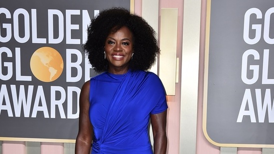 Viola Davis, who is nominated for best film drama actress for her star turn in The Woman King looked regal in a royal blue one-shoulder Jason Wu gown with ruching.(Invision/AP)