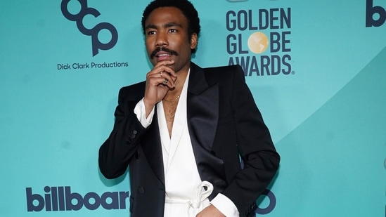 Donald Glover was practically in PJs. He wore a comfy robe shirt which he paired with relaxed white trousers. The look was Saint Laurent.(Invision/AP)