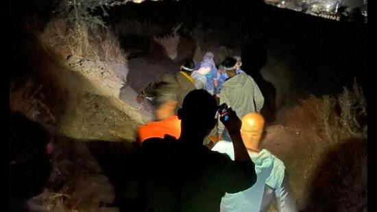 A search operation was launched by the Talegaon Dabhade police team in collaboration with the Shiv Durga trekking group and the Maval Wildlife rescue team. (HT PHOTO)