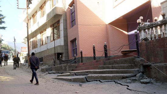 A road in Joshimath with prominent cracks as seen on Tuesday. A road in Joshimath with prominent cracks as seen on Tuesday.