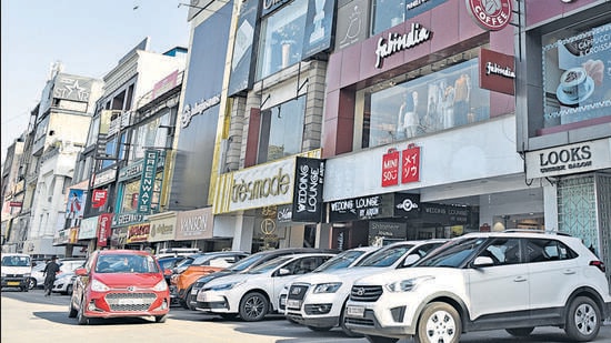 Advertisement boards at South Extension Market in Delhi. (Sanchit Khanna/HT Archive)