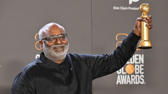 Composer MM Keeravani poses with the award for Best Song - Motion Picture for Naatu Naatu from RRR. (Photo by Frederic J. Brown / AFP)(AFP)