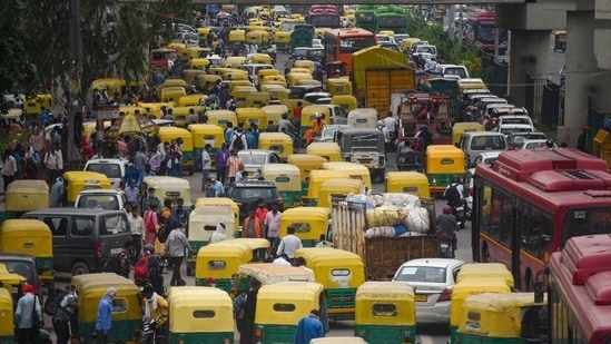 A pool of auto rickshaws seen outside Anand Vihar Bus Terminal in New Delhi on August 18, 2022. (Amal KS / HT Photo)