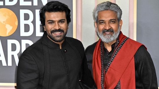 Actor Ram Charan and director SS Rajamouli arrive for the 80th annual Golden Globe Awards at The Beverly Hilton hotel in Beverly Hills, California, on January 10, 2023. (Photo by Frederic J. Brown / AFP)(AFP)