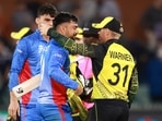 Australia's David Warner, right, embraces Afghanistan's Rashid Khan following their T20 World Cup cricket match in Adelaide Australia's David Warner, right, embraces Afghanistan's Rashid Khan following their T20 World Cup cricket match in Adelaide