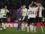 Players greet each other at the end of the English League Cup quarter final soccer match between Southampton and Manchester City at St Mary's stadium in Southampton, England, Wednesday, Jan. 11, 2023. Southampton won 2-0. (AP Photo/Alastair Grant)(AP)