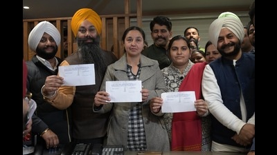 AAP candidates Jasbir Singh Laddi (mayor), Taruna Mehta (senior deputy mayor) and Suman Devi (deputy mayor ) after filing their nominations at the MC office in Sector 17, Chandigarh, on Thursday. (Ravi Kumar/HT) AAP candidates Jasbir Singh Laddi (mayor), Taruna Mehta (senior deputy mayor) and Suman Devi (deputy mayor ) after filing their nominations at the MC office in Sector 17, Chandigarh, on Thursday. (Ravi Kumar/HT)