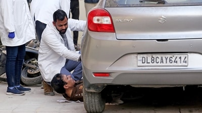 FSL team conducts an inspection of the car along with the team of police at Sultanpuri police station in the Kanjhawala death case in New Delhi. (ANI) FSL team conducts an inspection of the car along with the team of police at Sultanpuri police station in the Kanjhawala death case in New Delhi. (ANI)