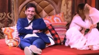 A still from the promo of Bigg Boss 16 featuring Archana Gautam and Sreejita De's fiancé. A still from the promo of Bigg Boss 16 featuring Archana Gautam and Sreejita De's fiancé.