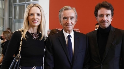 Delphine Arnault (left) and Bernard Arnault (centre). File Photo/AFP Delphine Arnault (left) and Bernard Arnault (centre). File Photo/AFP