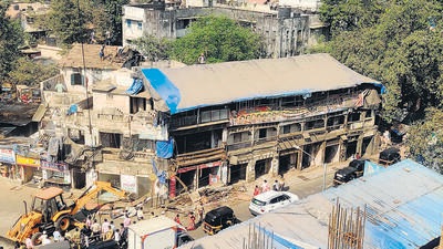 The property is expected to be redeveloped at some other location, the details of which are not clear yet. The building was in a dilapidated condition and was marked under C1 dangerous category. Nearly 17 families and 19 commercial tenements housed in the building had vacated after the Bombay high court had dismissed their petition challenging the BMC notice, issued under section 354 of MMC Act. (HT PHOTO)