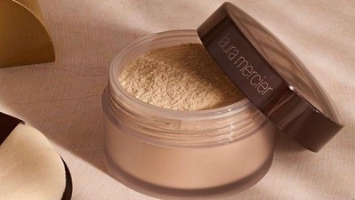 Use a light dusting of setting powder to keep your makeup in place, but be sure to use it sparingly to avoid a heavy or cakey look. (Pinterest) Use a light dusting of setting powder to keep your makeup in place, but be sure to use it sparingly to avoid a heavy or cakey look. (Pinterest)