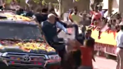 Man breaches PM Modi's security in Karnataka's Hubballi, pulled away (Screengrab from video) Man breaches PM Modi's security in Karnataka's Hubballi, pulled away (Screengrab from video)