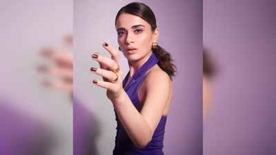 Radhika Madan accessorised her look with golden earrings and opted for the sleek hairdo with voluminousness low-ponytail. (Instagram/@radhikamadan) Radhika Madan accessorised her look with golden earrings and opted for the sleek hairdo with voluminousness low-ponytail. (Instagram/@radhikamadan)