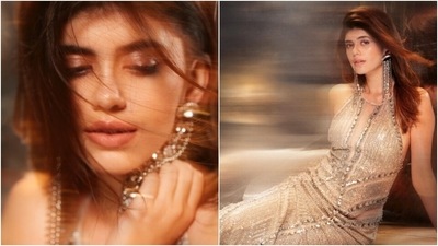 Sanjana Sanghi is an absolute fashionista. The actor keeps setting the fashion bar higher for us with snippets from her fashion diaries on her Instagram profile on a regular basis. On Thursday, Sanjana drove our midweek blues far away with a set of pictures of herself looking like a queen. Take a look at her pictures here. (Instagram/@sanjanasanghi96) Sanjana Sanghi is an absolute fashionista. The actor keeps setting the fashion bar higher for us with snippets from her fashion diaries on her Instagram profile on a regular basis. On Thursday, Sanjana drove our midweek blues far away with a set of pictures of herself looking like a queen. Take a look at her pictures here. (Instagram/@sanjanasanghi96)