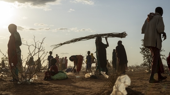 Locals displaced due to drought are seen settling at a camp on the outskirts of Dollow, Somalia, on September 19, 2022. Large swathes of northern Africa, the Middle East, China, and central Asia saw unprecedented warmth averaged across the whole of 2022, Copernicus said. (Jerome Delay / AP)