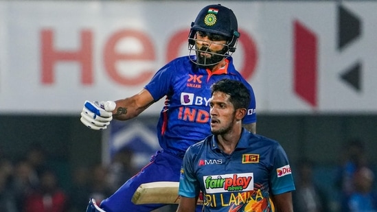 Indian batter Virat Kohli celebrates his century during the 1st ODI cricket match between India and Sri Lanka, at Barsapara stadium in Guwahati.(PTI)