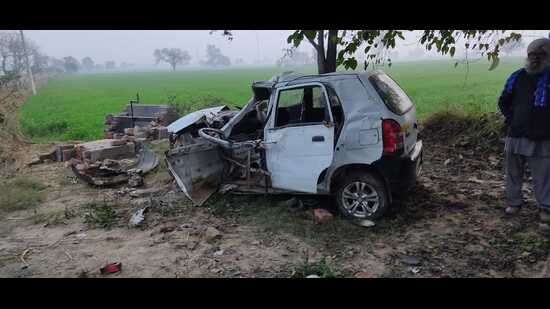 The damaged Alto car in which the family was travelling in Chhahar village in Sangrur. (HT Photo)