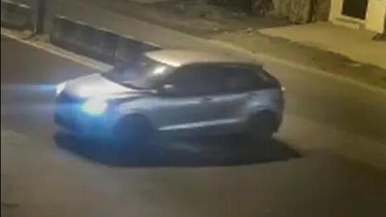 Video grab of a car that reportedly hit a woman and dragged her for kilometers, in the Sultanpuri area of Delhi. (PTI photo)