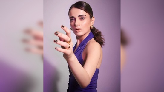 Radhika Madan accessorised her look with golden earrings and opted for the sleek hairdo with voluminousness low-ponytail.(Instagram/@radhikamadan)