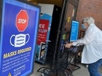 Covid In US: People shop at a grocery store enforcing the wearing of masks in Los Angeles.(AFP File) Covid In US: People shop at a grocery store enforcing the wearing of masks in Los Angeles.(AFP File)