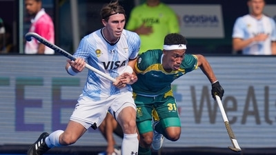 Argentina's Maico Casella and South Africa's Ryan Julius vie for the ball during the FIH Odisha Hockey Men's World Cup 2023 match between Argentina and South Africa, at Kalinga Hockey Stadium in Bhubaneswar, Friday, Jan. 13, 2023. (PTI Photo/Shailendra Bhojak)(PTI01_13_2023_000127B) (PTI) Argentina's Maico Casella and South Africa's Ryan Julius vie for the ball during the FIH Odisha Hockey Men's World Cup 2023 match between Argentina and South Africa, at Kalinga Hockey Stadium in Bhubaneswar, Friday, Jan. 13, 2023. (PTI Photo/Shailendra Bhojak)(PTI01_13_2023_000127B) (PTI)