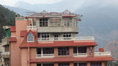 The demolition of two badly damaged hotels in Joshimath was underway on Friday. (Rajeev Kala) The demolition of two badly damaged hotels in Joshimath was underway on Friday. (Rajeev Kala)