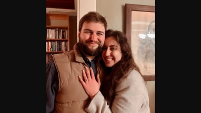 The image shows the woman with her fiance. She shared a text on Twitter from when he asked her out for the first time. (Twitter/@SarahHopeWeaver)