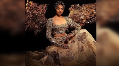 Divita Rai's ensemble features intricate gold metallic hand embellishments that "are a true example of the finest craftsmanship of our artisans." (Instagram/@abhisheksharmastudio) Divita Rai's ensemble features intricate gold metallic hand embellishments that "are a true example of the finest craftsmanship of our artisans." (Instagram/@abhisheksharmastudio)