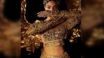 The elaborated golden wings, which were the highlight of her costume, represent the power of nourishment and care that India has shown in the difficult times towards the citizens of the world and took care and stood as support with the notion "One World One Family." (Instagram/@abhisheksharmastudio) The elaborated golden wings, which were the highlight of her costume, represent the power of nourishment and care that India has shown in the difficult times towards the citizens of the world and took care and stood as support with the notion "One World One Family." (Instagram/@abhisheksharmastudio)